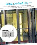 Installed 4-piece glass door hinge set for cabinets and bookcases; metal silver hinges with mounting screws (close-up)