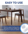 10 Pack Adjustable Furniture Levelers And Flexible Shims To Knock Out Pesky Wobbles On Couches Tables And Uneven House Floors With Strong Nonslip Grip Design, clear leveling shims under a wooden table.