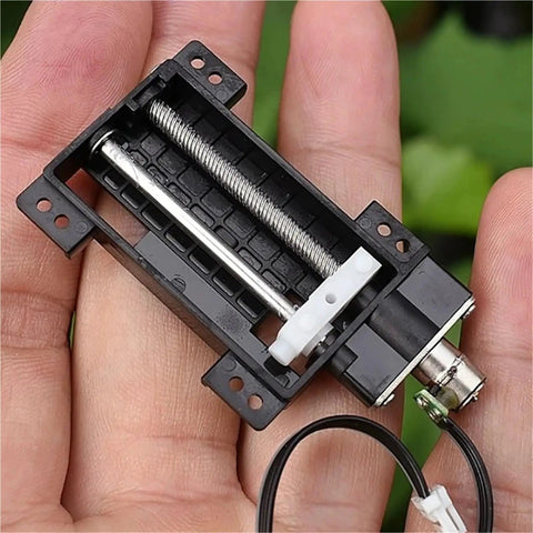 5 Pcs Heavy Duty Linear Actuator 30mm Stroke showing internal mechanism in hand, suitable for DIY projects and automation.