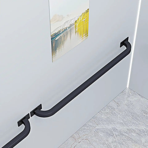 Top Shelf Galvanized Steel Pipe Handrail With Wall Mount Kit Built Ridiculously Solid For Indoor Outdoor Stairs Deck Porch, black rail mounted on wall.