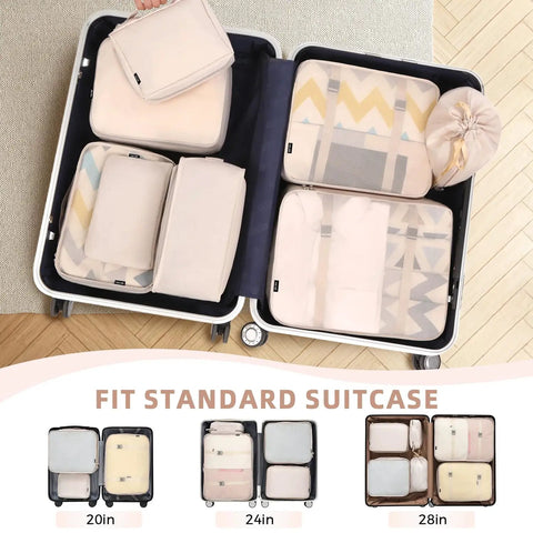 Open suitcase with cream Eight Piece Packing Cubes Set For Travel Luggage Organizers In Cream That Keeps Clothes Wrinkle Free