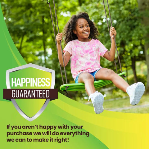 Child enjoying Stand Up Tree Swing For Kids With Adjustable Handles, Surf Style Kick Swing, green board outdoors.