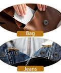 Close-up of 12 Set 15mm Metal Snap Button Kit With 4 Install Tools For Leather Jackets Bags Fabric Jeans And DIY Sewing Black Pro Grade Sturdy Snaps For Clothing Repairs Craft Projects And Quick Secure Closures installed on a brown bag and blue jeans.