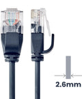 Close-up of Cat6A Ultra Slim Ethernet Patch Cable 20 Ft 34AWG U/UTP Black showing cable thickness and connectors