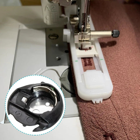 Must-Have Universal Bobbin Case For A Ton Of Sewing Machines Compatible With Brother And Baby-Lock Replacement Parts XC3152221 XE7560001 For SE400 SE600 SE625 CS6000I PE800 LX3817 And More. White plastic bobbin case installed in a sewing machine, black metal case inset