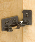 Top Shelf Semi Concealed Cabinet Door Hinges Pair Of 2 Featuring Soft Close Antique Brass Finish and Adhesive Cork Bumpers For No Sweat Frameless Or Face Frame Overlay Upgrade With Silky Smooth Silent Operation close-up on mounting.