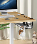 Under Desk Cable Management Tray No Drill Easy Install Steel Wire Organizer installed with cords under a wooden desk near a computer