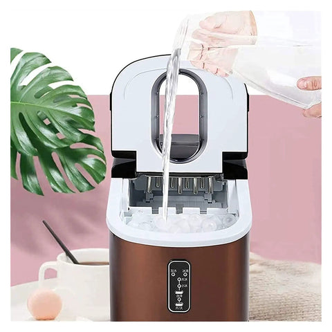 Heavy Hitter Countertop Ice Maker Churning Out Sixteen Kilos Daily With Nine Ice Cubes Ready In Just Thirteen Minutes Auto Self Cleaning Compact Design Includes Scoop And Basket pouring water into machine