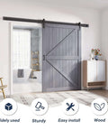 Gray Wood Barn Door Slab 54x84 Inches With 9 Foot Barn Door Hardware Track Kit installed in living room, K Frame design