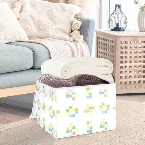 Stackable Storage Bins With Lids, 16.5 By 12.6 By 11.8 Inch Foldable Closet Organizers holding rolled blankets in a living room.