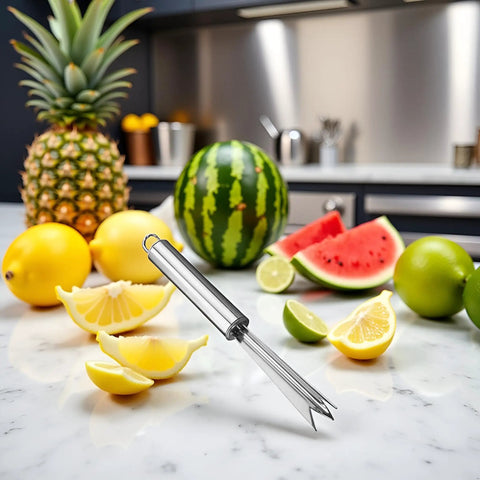 Pineapple Eye Remover Tool With V Shaped Stainless Steel Blade on kitchen counter with fruits