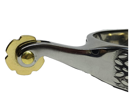 Close-up of stainless steel cowboy spurs with copper gear, Western equestrian gear for men and women, detailed side view