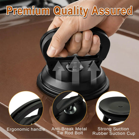 Hand using Dent Puller Kit 3 Pack With One Large Black Suction Cup And Two Small Orange Cups For Paintless Car Dent Repair.