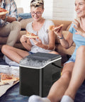 Top Notch Portable Ice Maker creating nine bullet cubes in six minutes, perfect for summer fun with friends.