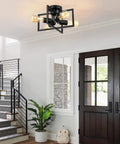 4 Light Matte Black Sputnik Style Semi Flush Mount Ceiling Light With E26 Base in modern entryway with stairs and potted plant