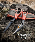 Take-A-Part Poultry And Small Game Shears With Serrated Blades, Pivot Pin Release, Bright Orange Rubber Handle, and belt sheath on rock