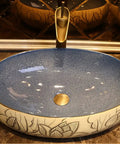 Bathroom Sinks Bathroom Vessel Sink Carved Lotus Art Countertop Basin with smooth blue and floral ceramic design.