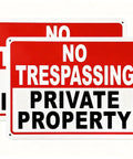 Private Property No Trespassing Signs 10x7 Inch 40 Mil Aluminum Reflective UV Printed Weatherproof Easy To Mount High Visibility Security Sign For Home And Business 2 Pack shown overlapping