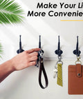 Hand adding keys to hooks with 80 Pack Hella Durable Swivel Clasp Hooks Key Chain Clips With Secure D Ring Lanyard Hardware.