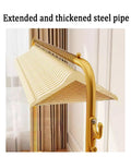 Extended and thickened steel pipe detail with hangers on Beefy Free Standing Metal Clothes Rack With Shelves For Boutique Or Home Use Black