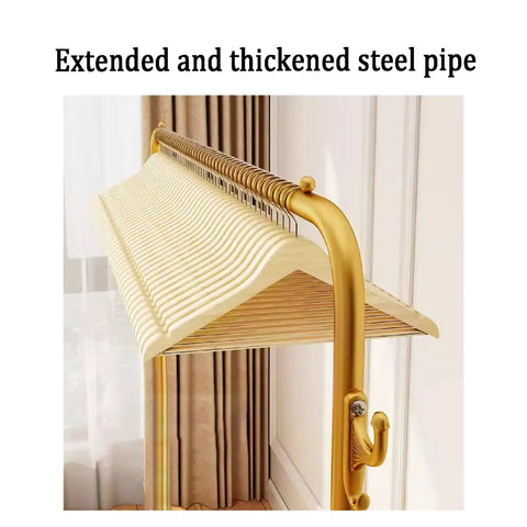 Extended and thickened steel pipe detail with hangers on Beefy Free Standing Metal Clothes Rack With Shelves For Boutique Or Home Use Black