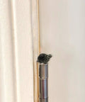 Tiny magnetic turtle head ornament on door hinge, part of the Cute Tortoise Hinge Heads Decorative Topper Set Of Six For Doors And Metal Surfaces.