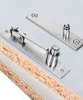 Heavy Duty Hidden Door Pivot Hinge For Wood Doors Provides Full Rotation Concealed Door Hinges Silver Steel Finish close-up view.