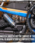 Applying BananaSlip Tungsten Wet Lube to a bike chain for a smooth ride with a 50ml bottle of biodegradable oil blend.