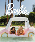 Oversized Inflatable Golf Cart Pool Float With Removable Fringe Canopy And Retro Styling Heavy Duty Vinyl Two Seater Water Lounger in pool with two women.