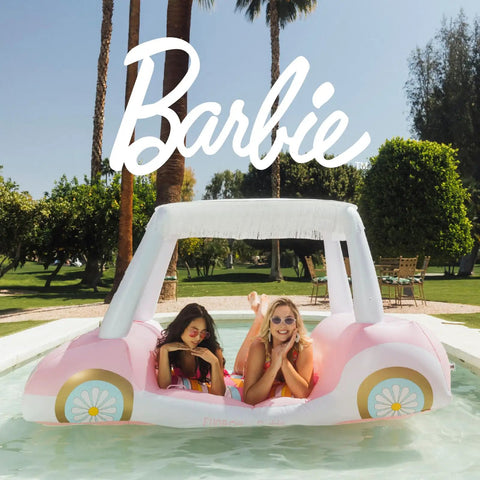 Oversized Inflatable Golf Cart Pool Float With Removable Fringe Canopy And Retro Styling Heavy Duty Vinyl Two Seater Water Lounger in pool with two women.