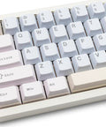 65 Percent Wireless Mechanical Keyboard Features Hotswap Switches Tri Mode Bluetooth And Usb Wiring Cnc Aluminum Body With Damped Acoustics Full Rgb Lighting Programmable Macros For Mac Windows Computers Making A Sick Daily Setup That Glides Buttery close-up of pastel-colored keycaps on a compact keyboard