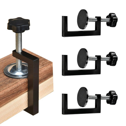 Four Piece Slick G Clamps For Woodworking Deliver Beast Grade Grip Heavy Duty Steel Build With Thickened Rubber Sleeves Smooth As Butter Action Reliable Diy Carpentry Project Gear on wooden surface.