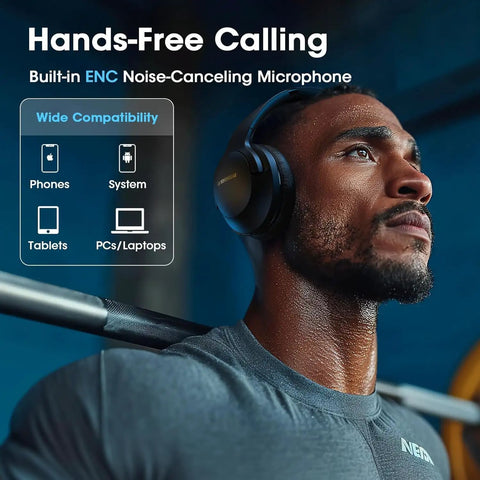 Man wearing over-ear wireless headphones with 80-hour battery life, deep bass EQ, ENC mic, foldable comfort for gym and travel.