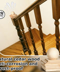 Set Of Four Bright Yellow Cedar Ball Finials For 4x4 Fence Posts Tough As Nails Wood Post Caps atop a railing, showcasing insect-proof finish.