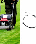 Heavy Duty Lawn Mower Control Cable With Mechanical Brake Linkage Super Badass Durable Genuine Replacement Fits Husqvarna 510 Riding Tractors Zero Drama Quick Swap installed on push mower in use on green grass.