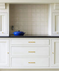 White kitchen cabinets with 25 Pack Brushed Brass Cabinet Knobs For Modern Kitchen Hardware Handles Gold Round Drawer Knobs visible