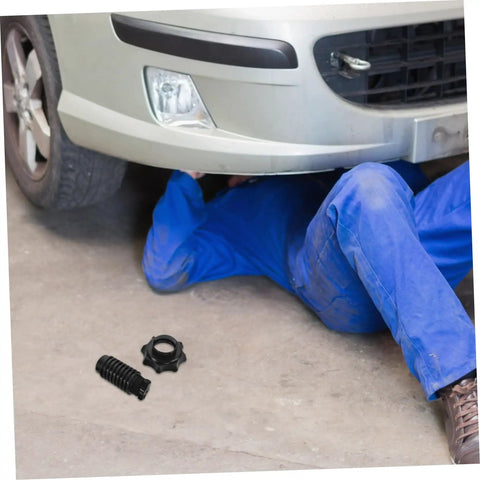 Mechanic installing Spare Tire Hold Down Bolt For Easy Vehicle Securement And Quick Install, heavy duty tire mounting screw visible