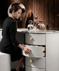 Woman opening cabinet with Gold Metal Cabinet Knobs 10 Pack - Round Drawer Pulls For Dressers, Cabinets, Bathroom Vanities