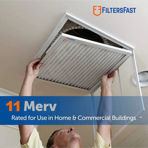 Man installing Actual Size 29.5 Inch By 35.5 Inch By 1.75 Inch Pleated Air Filter MERV 11 For Your Home HVAC Setup Fits 30 By 36 By 2 2 Inch Furnace Filter Six Pack Made In The USA in ceiling vent