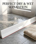 Bathroom with 3.5 Inch High Collapsible Shower Threshold Water Dam, 59 Inch Long Splash Guard Barrier in place.