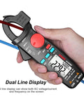 Hand holding DC Current Clamp Meter 6000 Counts Digital Multimeter Amp Continuity Ohm Hz Live Check V Alert Voltage Tester