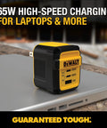 GaN 65W Three Port USB C Charger Block With PPS Fast Charge on top of a laptop, featuring a compact yellow foldable design.