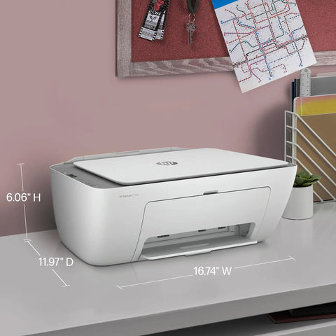 DeskJet 2755e Wireless Color Inkjet Printer With Scan Copy Easy Setup Mobile Printing Great For Home Use 1200 DPI Color Printing 60 Sheet Input Includes 6 Month Instant Ink Trial White, shown on a desk.