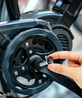 Inserting 2 Pack 8mm Bike Hex Crank Arm Bolt With Cap into mountain bike's capless bottom bracket for secure fit and installation