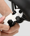 Kid Friendly Bike Seat Replacement With Post For Boys And Girls Cushioned Comfort Saddle being adjusted with a tool