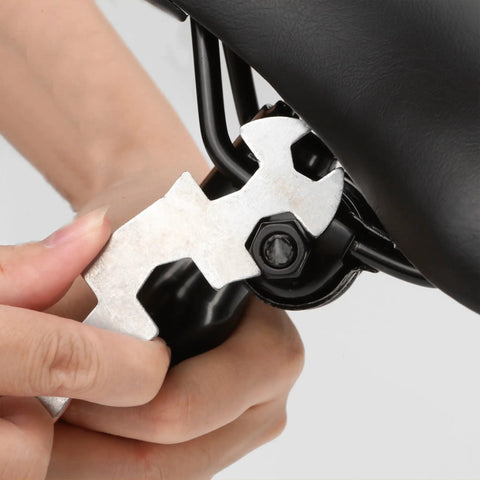 Kid Friendly Bike Seat Replacement With Post For Boys And Girls Cushioned Comfort Saddle being adjusted with a tool