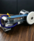 Straight Up Heavy Duty Wet Bench Grinder Featuring Electric Circulating Water Coolant System And Dead On Belt Alignment side view showing motor and coolant hose