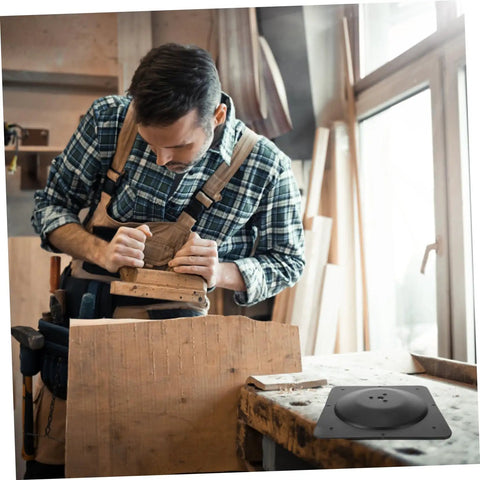 Woodworker using Heavy Duty Table Leg Brackets And Furniture Connector Plates Built Ridiculously Sturdy With Rock Solid Iron Mounting Design For Modern Diy Home Decor Quick Setup No Sweat Assembly Hardware in workshop.