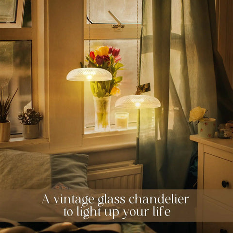 11.8 Inch Retro Glass Pendant Light With Clear Glass Shade And Antique Brass Finish in cozy bedroom setting