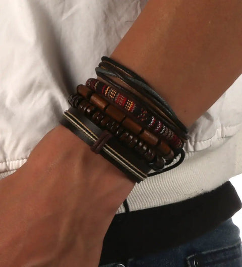 Handcrafted Hemp Cord And Genuine Leather Bracelet With Rustic Wooden Beads Adjustable Unisex Chain shown on wrist.